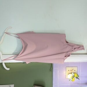 Lane Bryant bodysuit. Light, dusty pink color and spaghetti straps. Size 10/12.